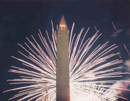 Fireworks behind the George Washington Monument, by William Earl Wells.